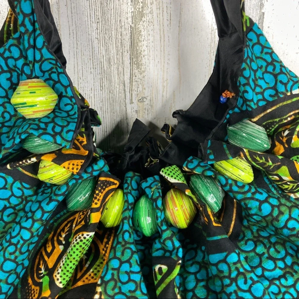 handmade travel hobo bag with paper bead design